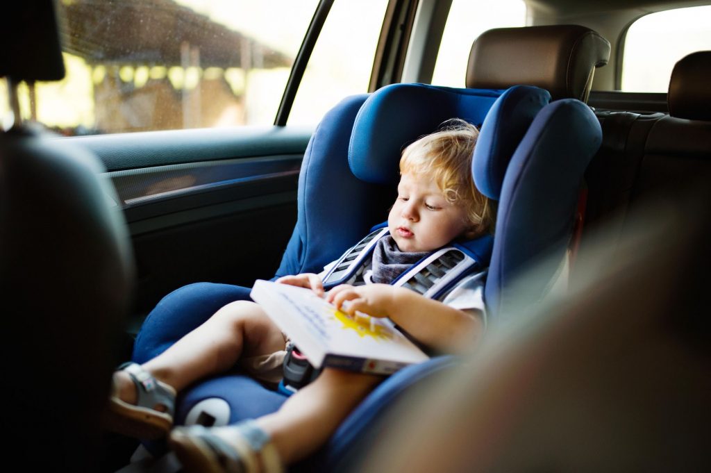 Books help when traveling with young kids in the car. 
