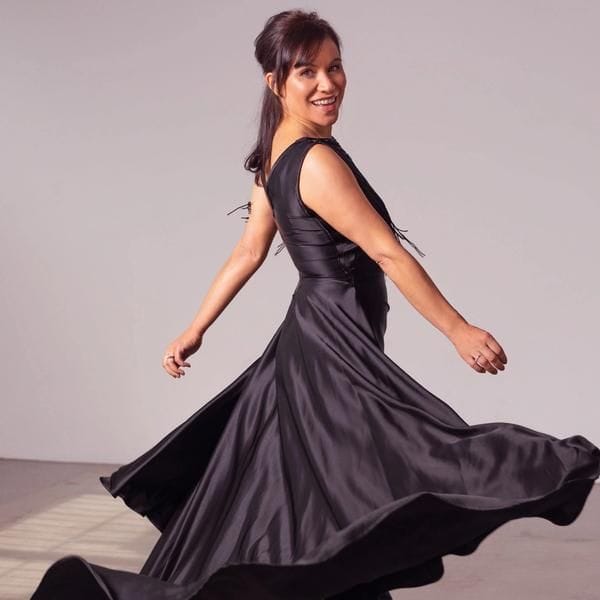 Stacey Morrison twirling in a dress