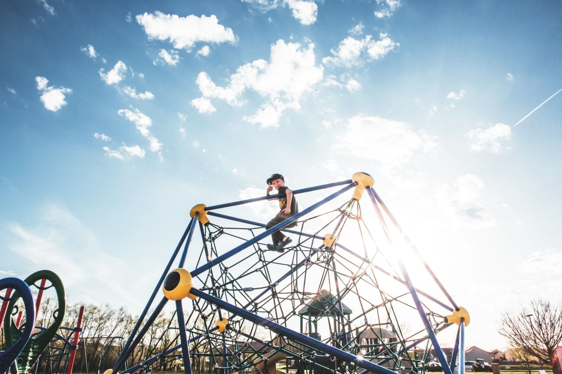 Child on climbing bars
