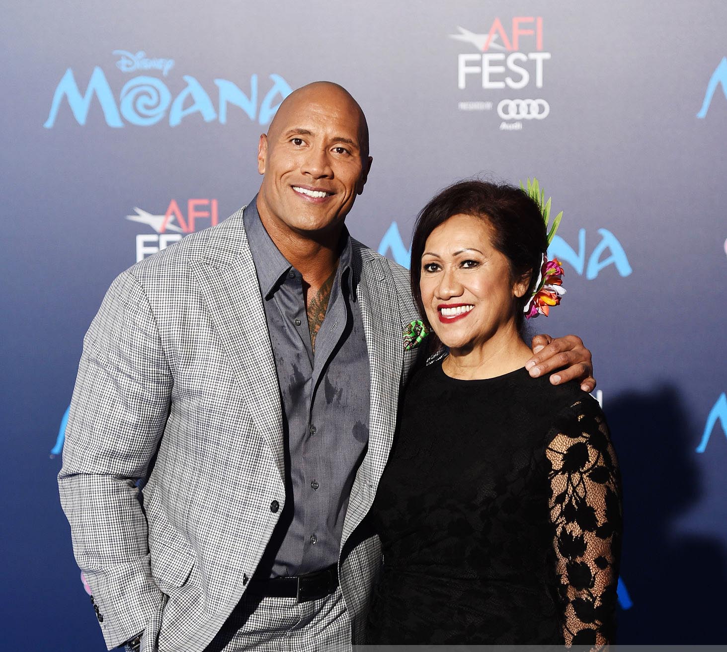 Dwayne 'The Rock' Johnson with his arm around mother Ata Johnson at the premiere of Disney Moana