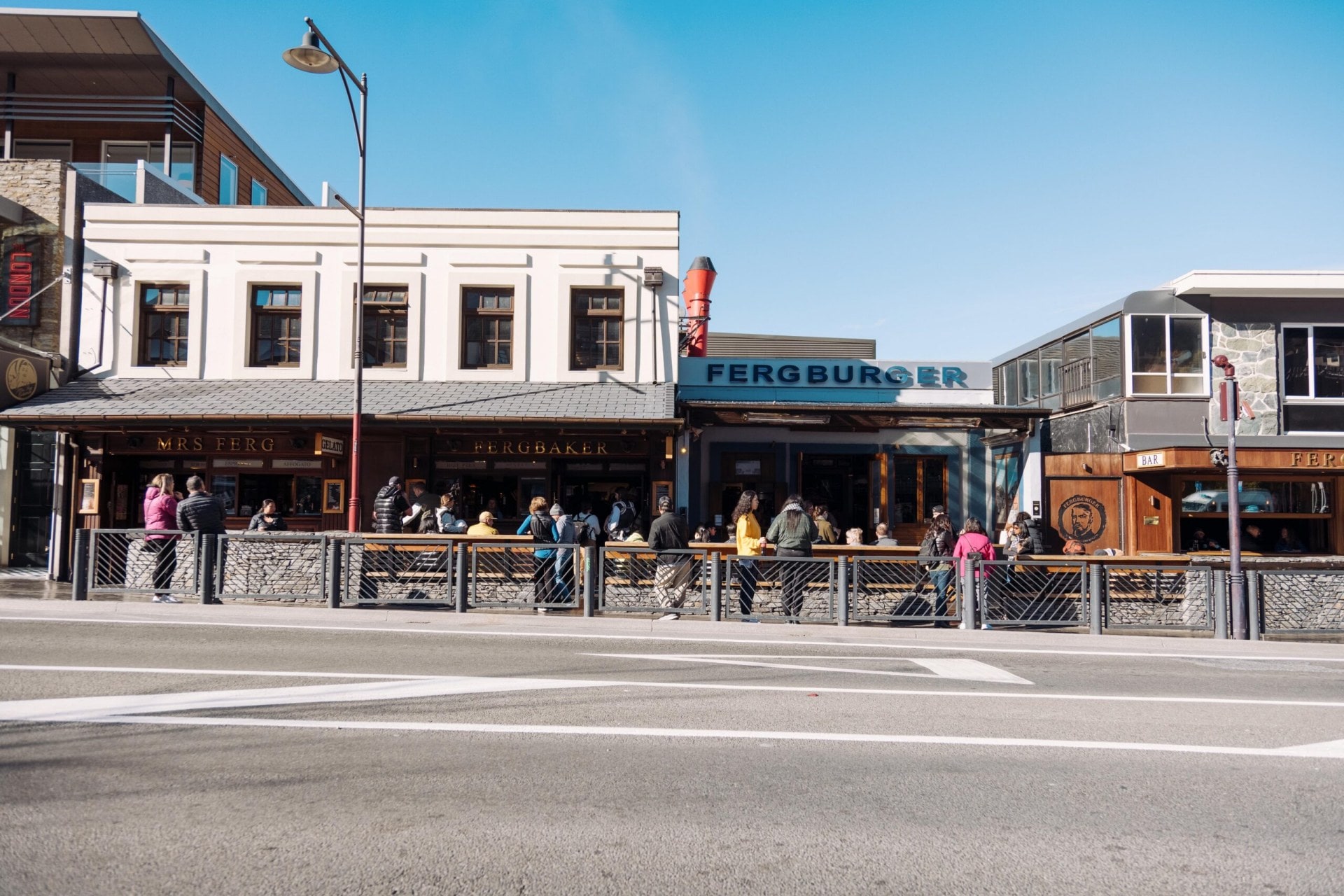 The exterior road and shopfront of Fergburger in Queenstown