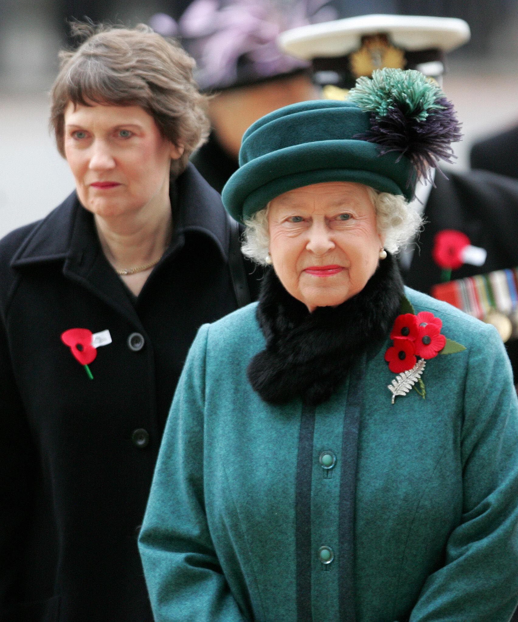 Helen Clark walking with Queen Elizabeth II on ANZAC Day