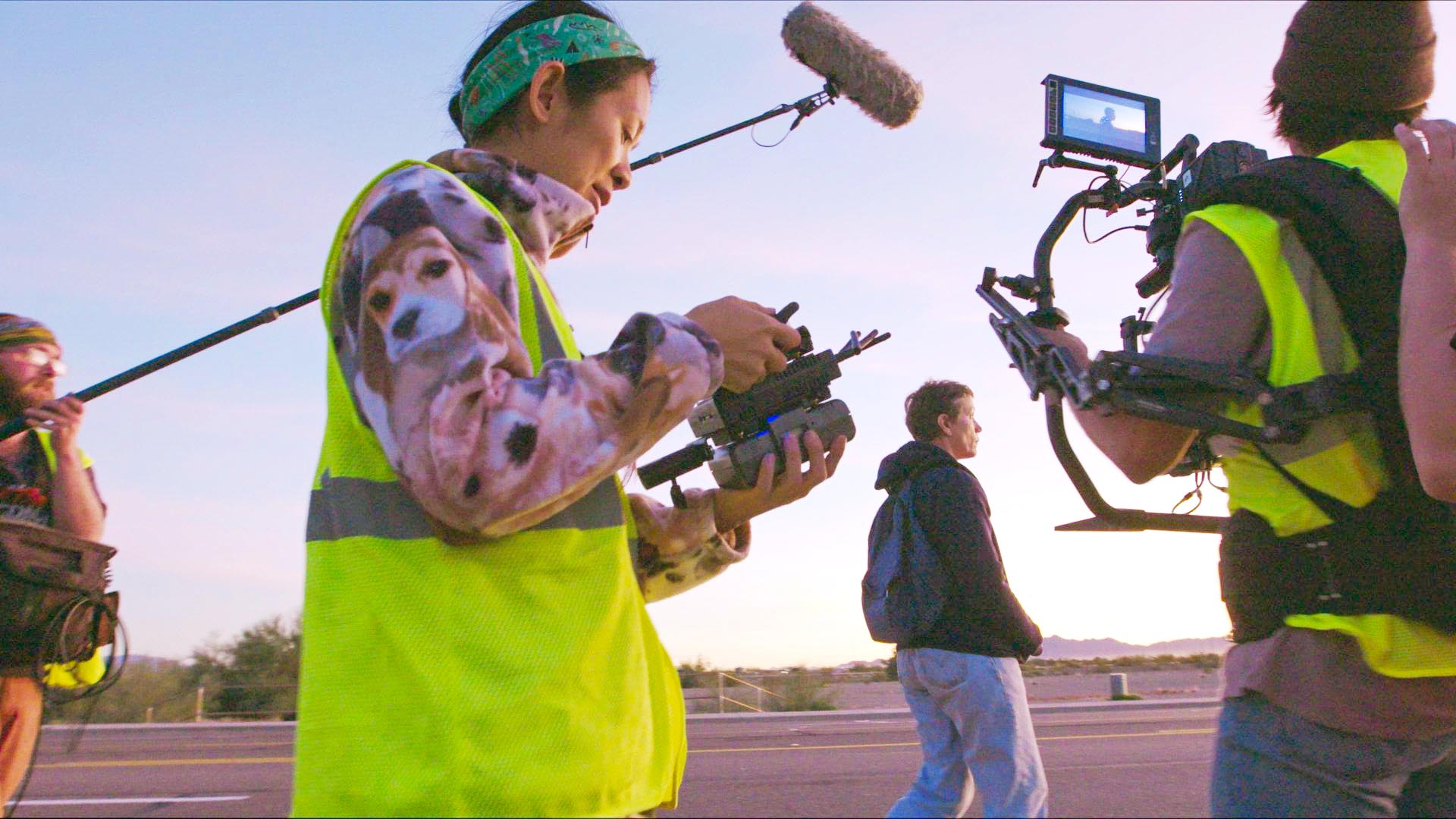 Frances McDormand and Chloé Zhao holding camera equipment on Nomadland