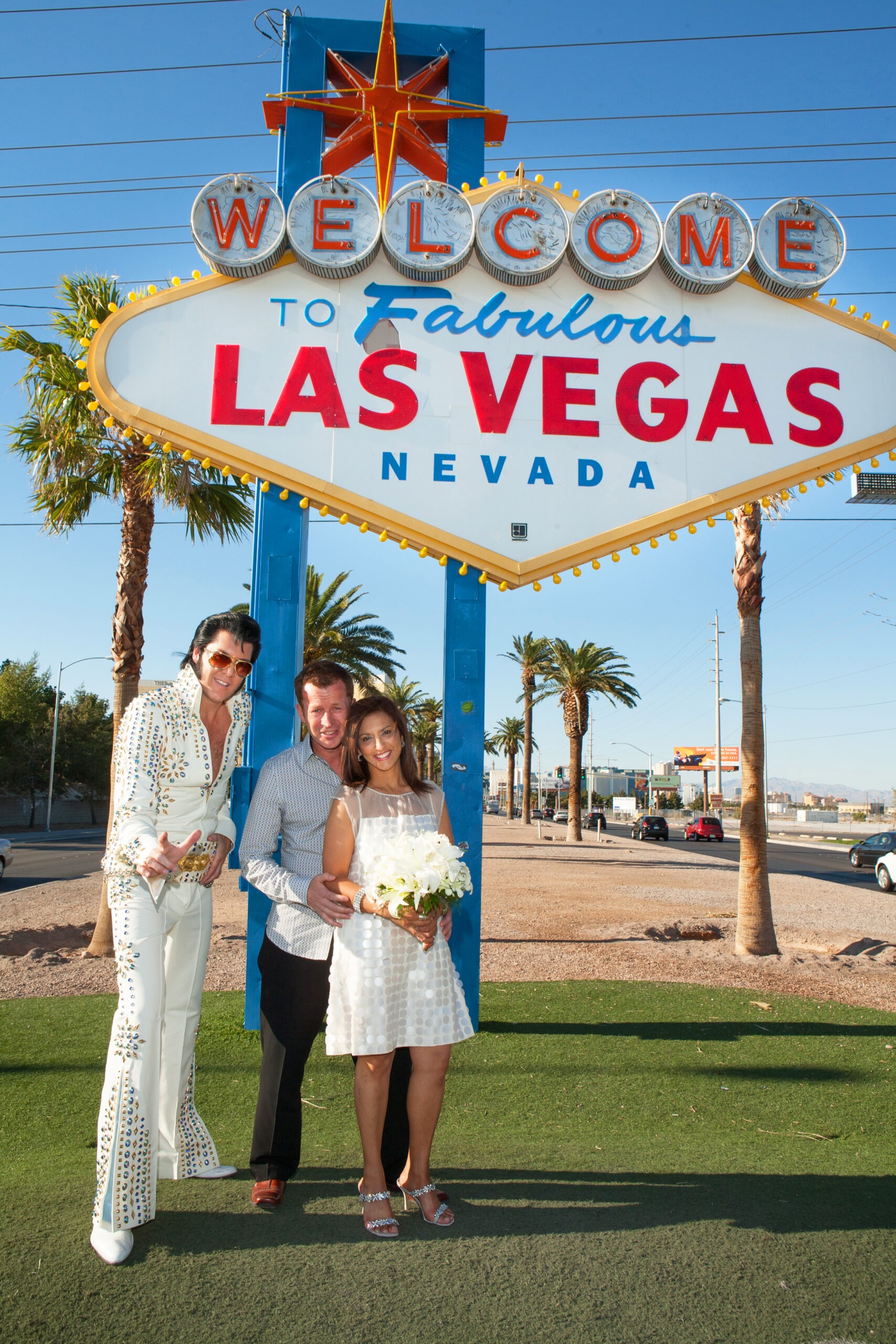 Sharon Stephenson and Martin Haughey and Elvis impersonator on their Vegas wedding day