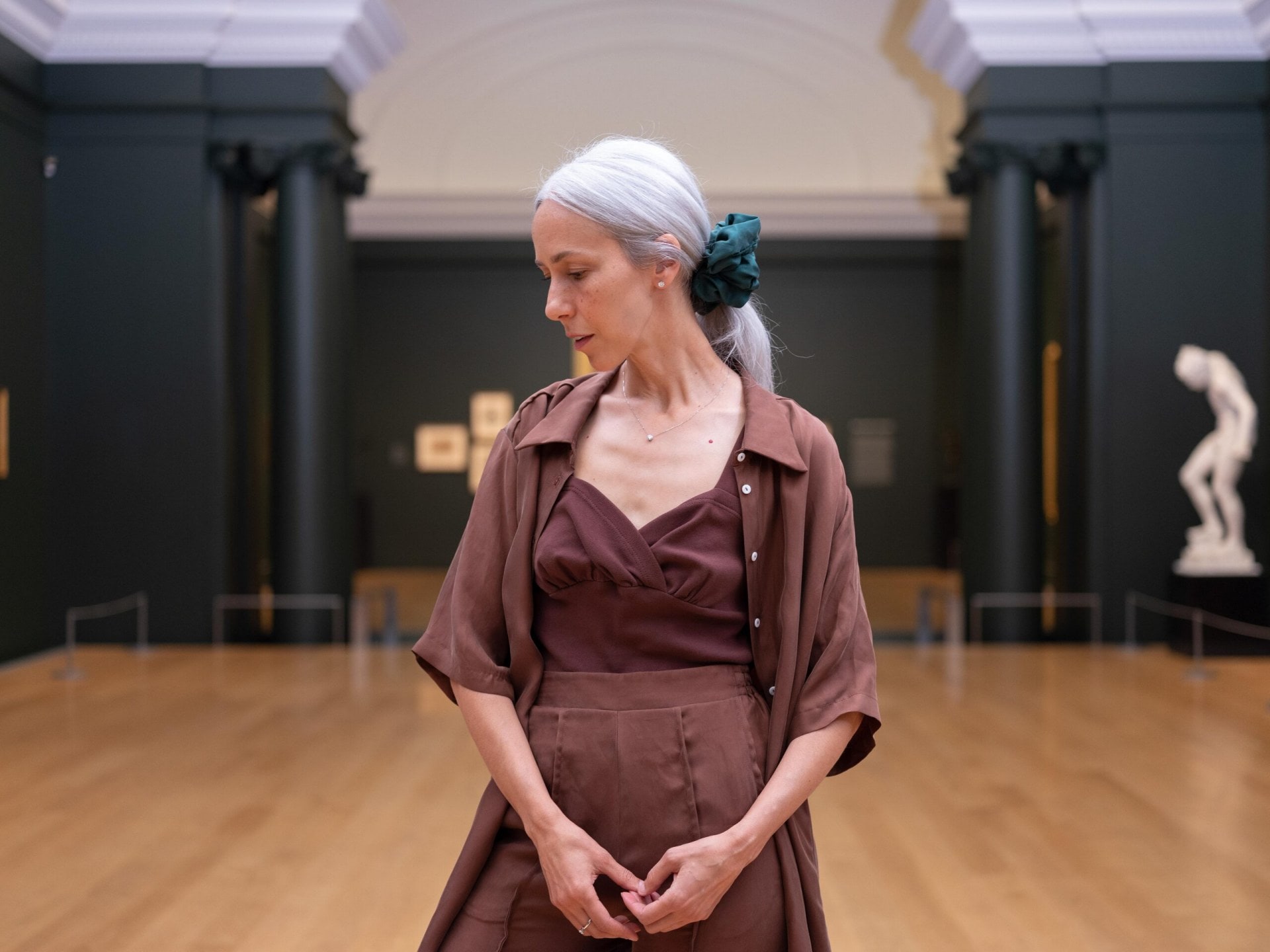 model wearing Ovna Ovich Painters shirt, $380, Ovna Ovich Gala bralette, $290, Ovna Ovich Eleanor trousers, $395, Gloria silk scrunchie, $40, The Floeting Diamond jewellery