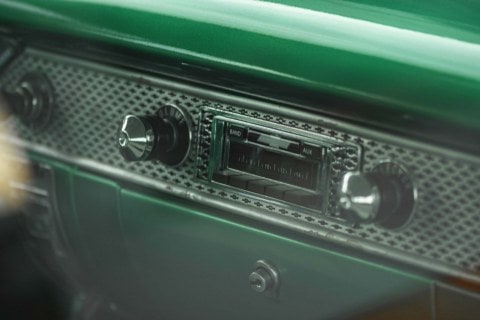 a vintage cassette player in a car