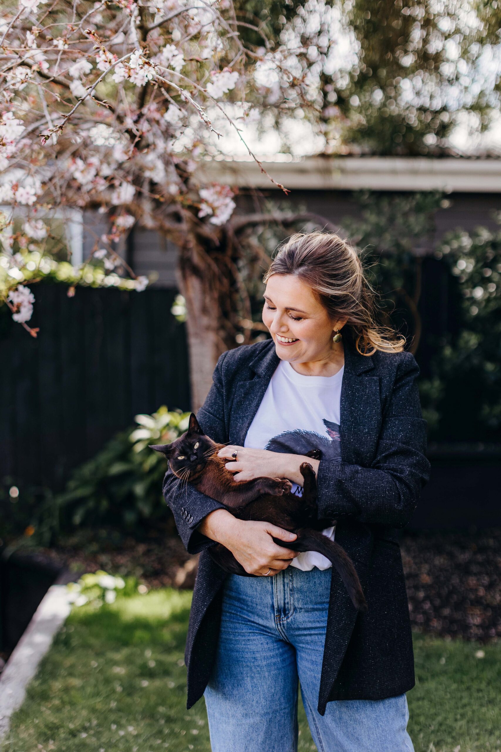 Charlotte Ryan holding her cat Minnie