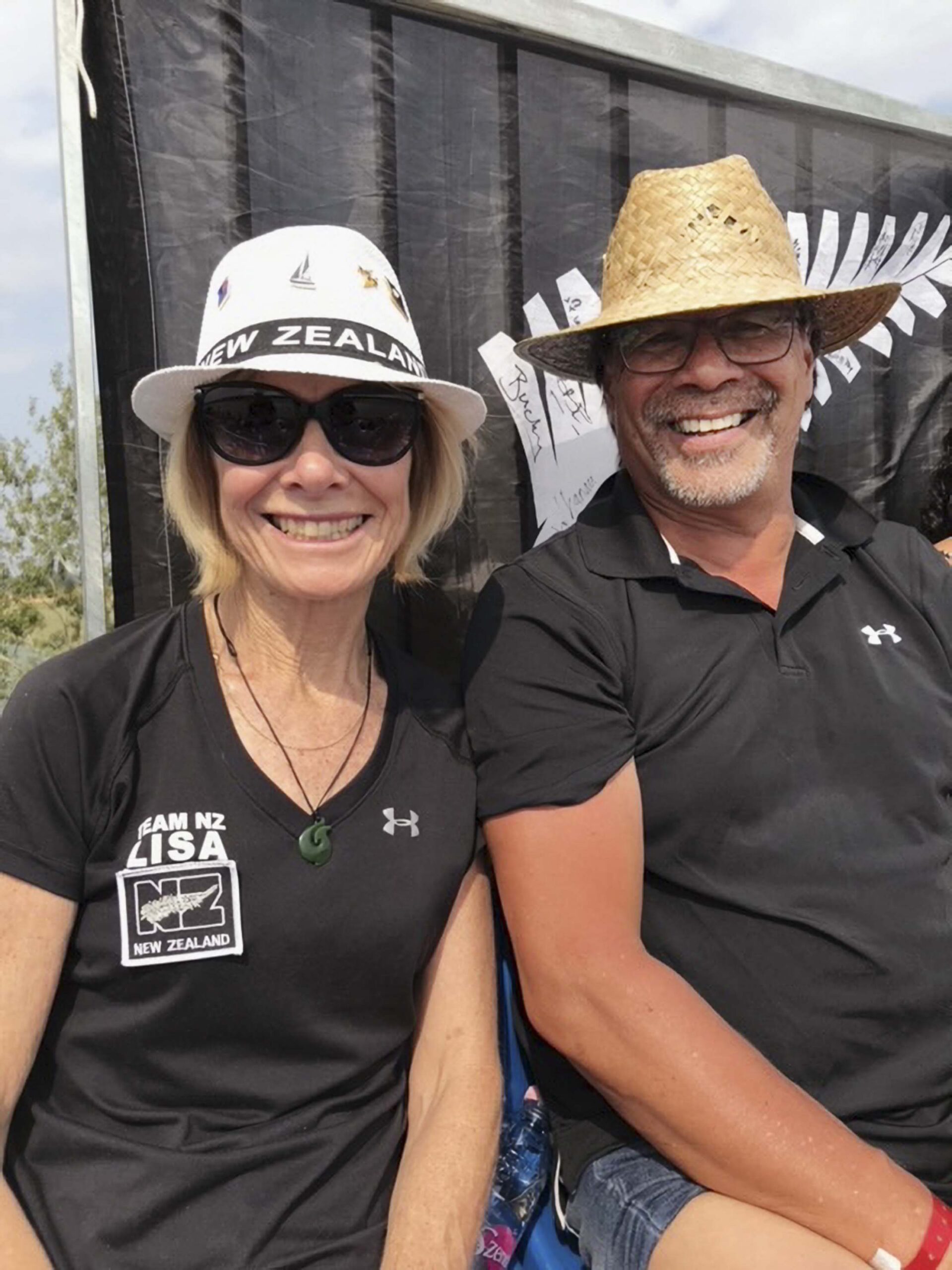 Lisa Carrington's parents Glynis and Pat in New Zealand supporters gear