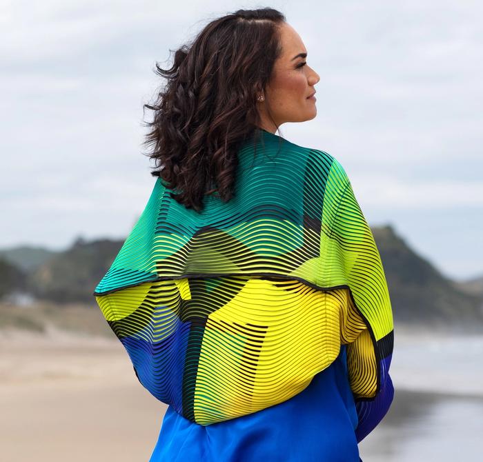 Tiana Epati in colourful dress at the beach