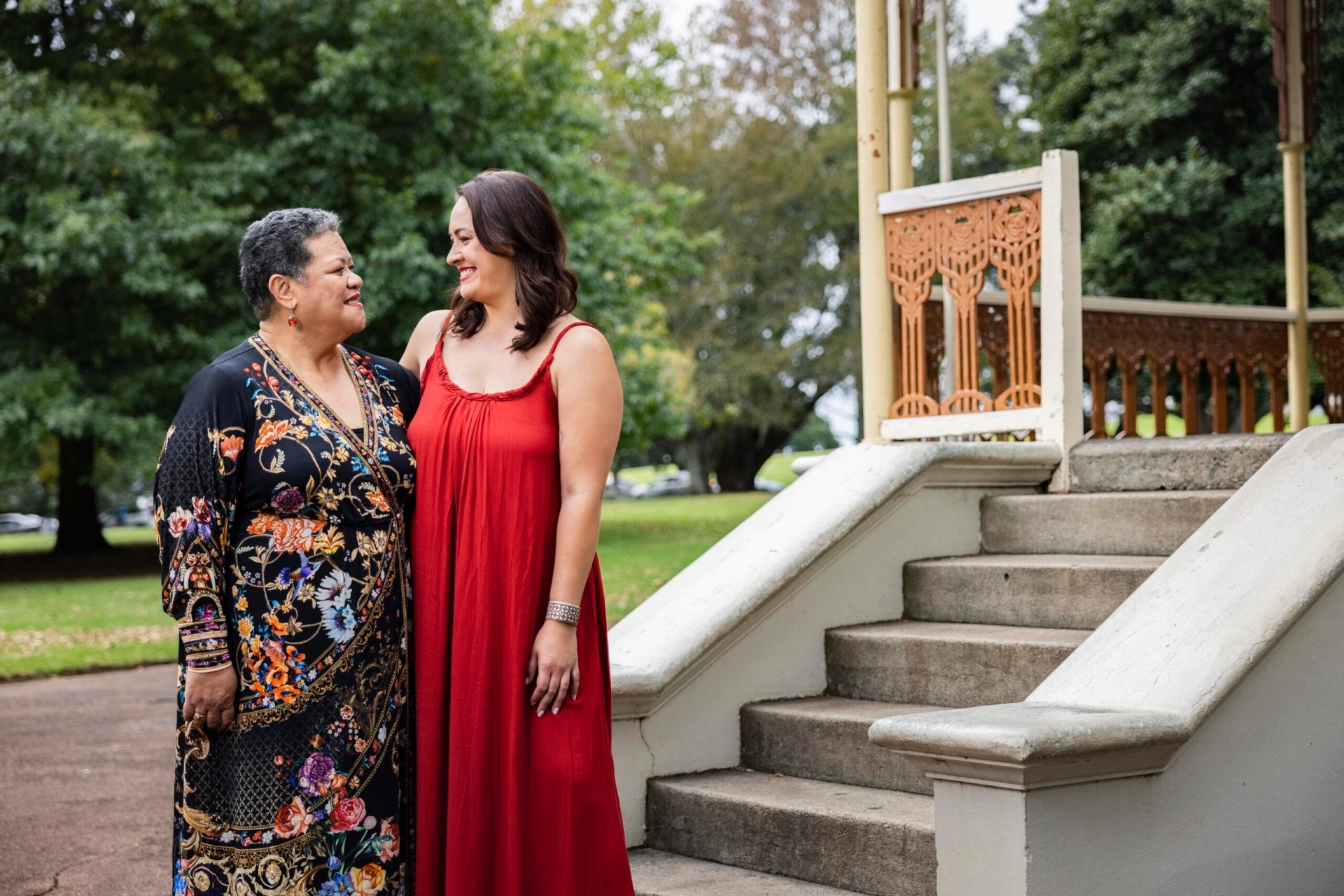 Stacey Leilua and Ana Tuisila smiling while looking at each other