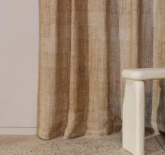 A curtain and a small table.