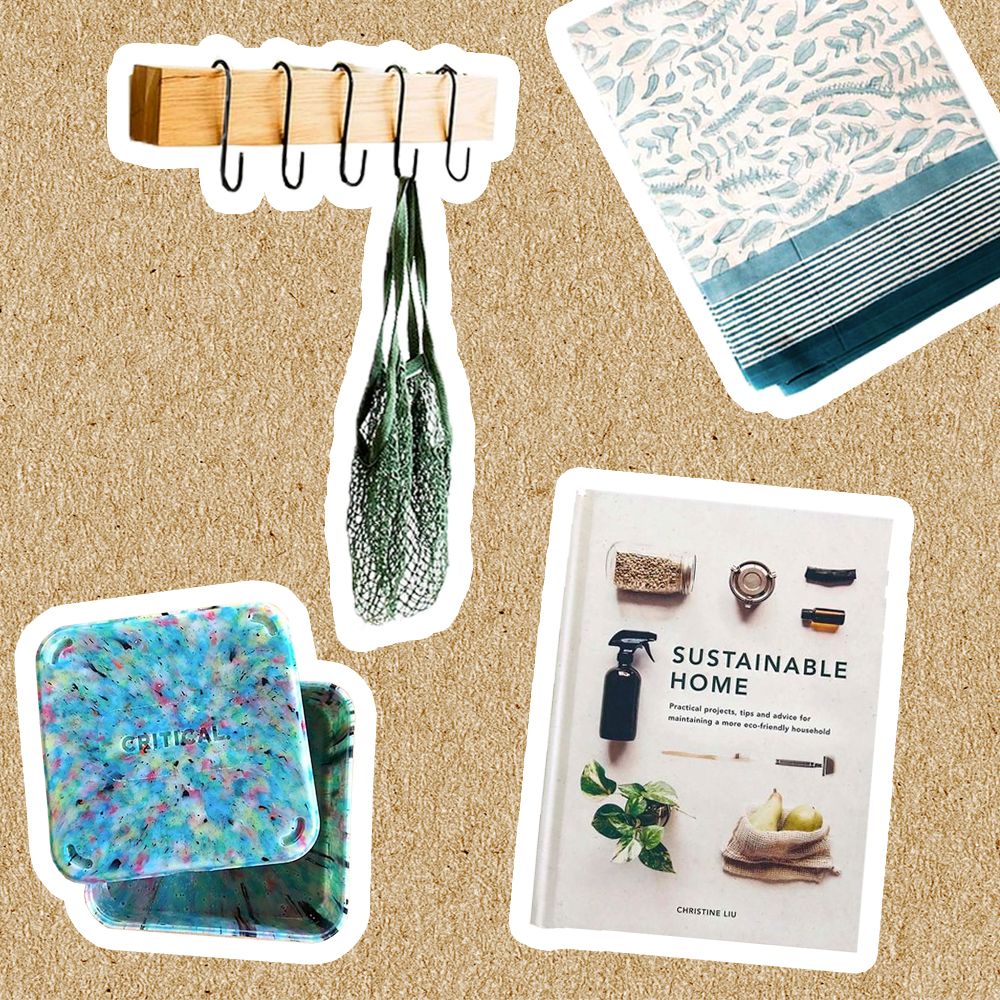 recycled plastic container, hooks with reuseable bag, Sustainable home book and cotton table cloth on brown paper background