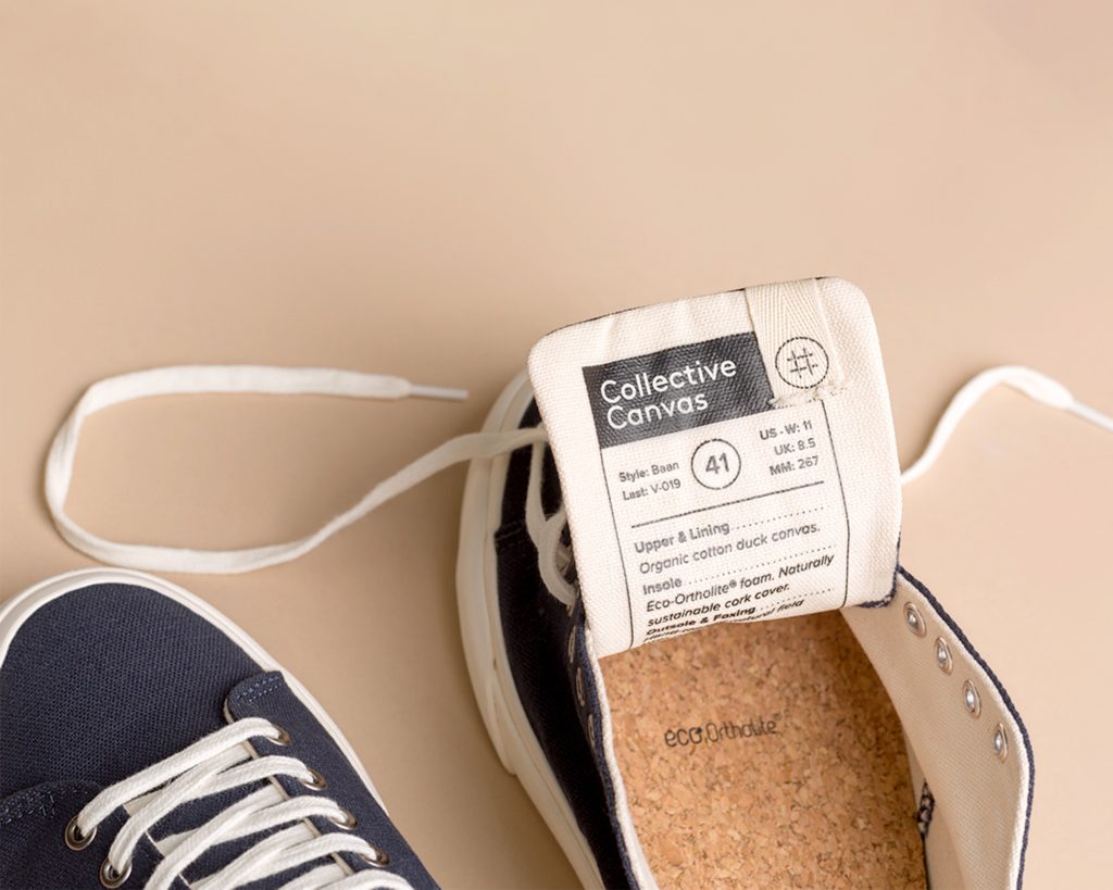Collective Canvas sneakers on a beige background