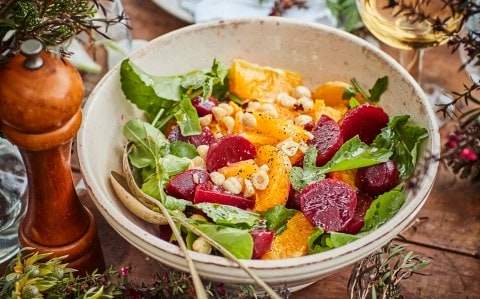 Bowl of beetroot and orange rocket salad