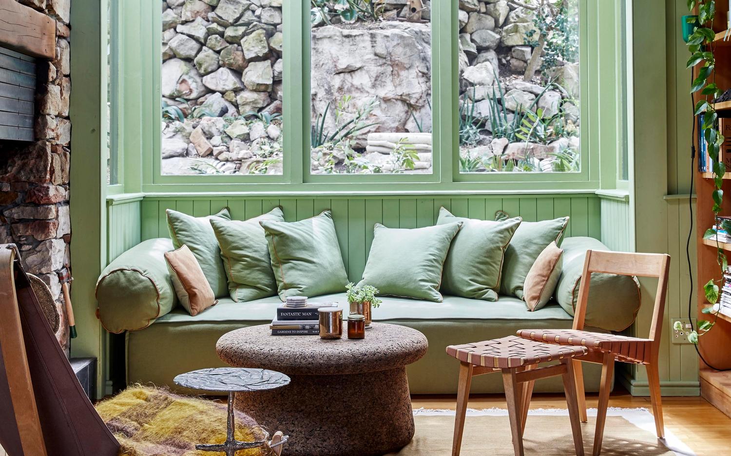 Cottage bench seat with green walls