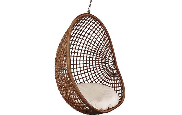 Synthetic rattan pod chair, $900 from Tee Pea Home.