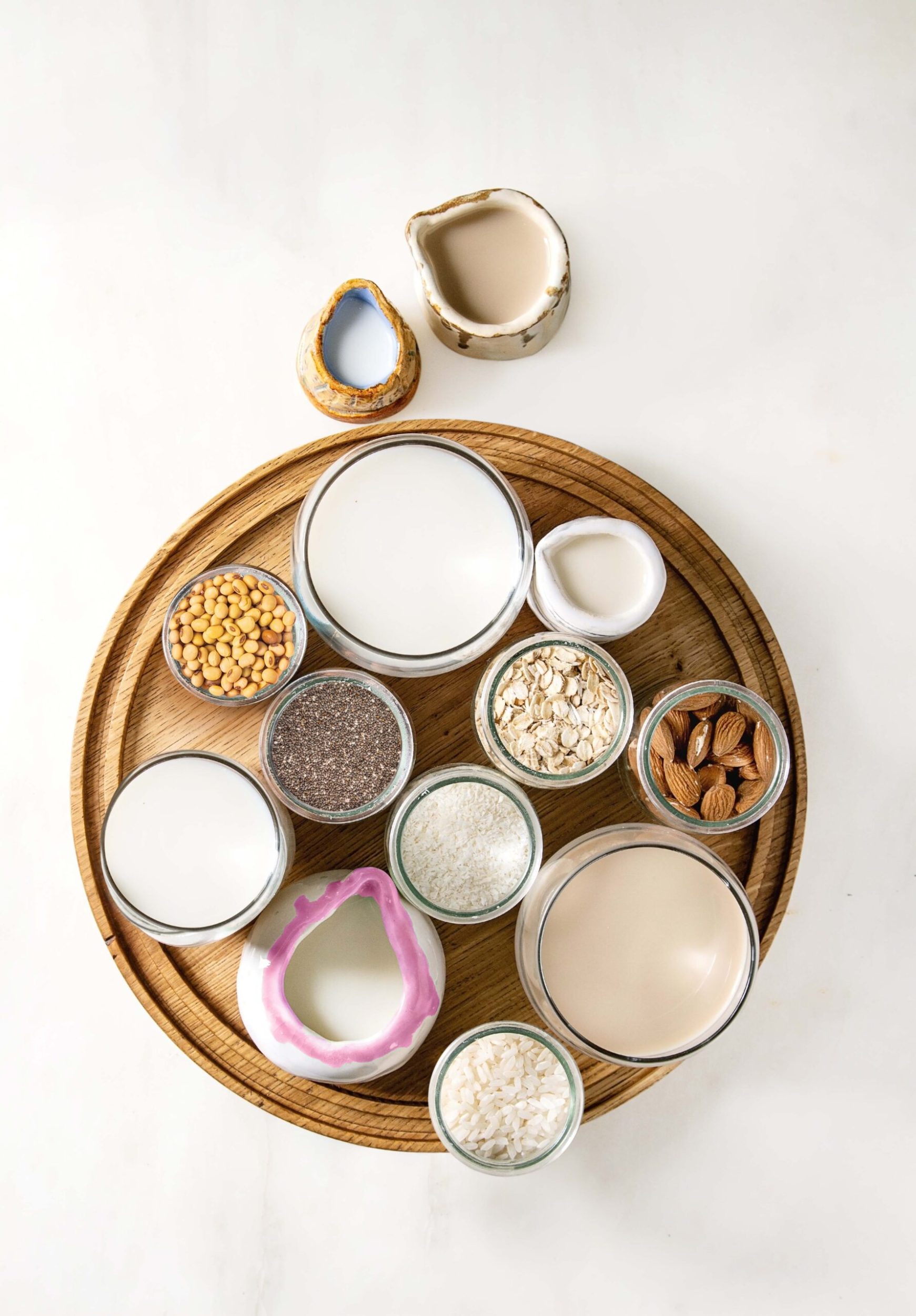 wooden tray of alternative milks