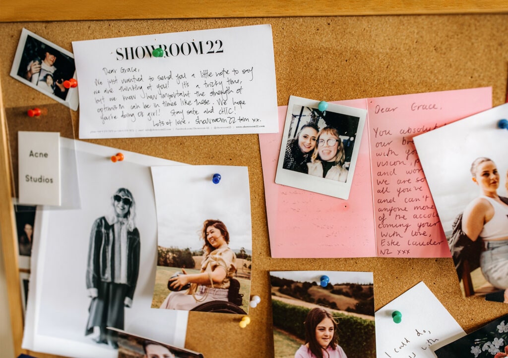 Wooden moodboard with notes and polariods