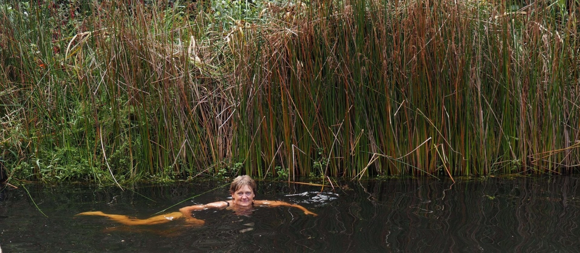 Annette Lees swimming in outdoor water