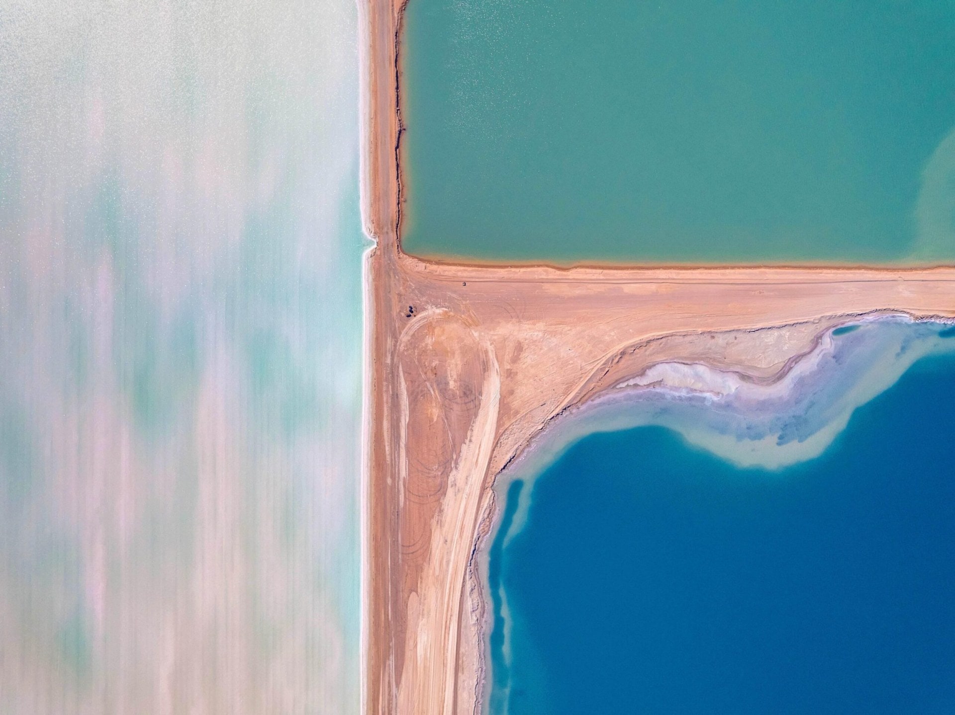Arial view of sea blue, green and light sea ponds