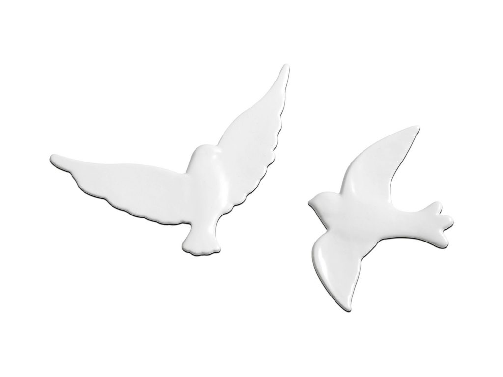 Two white ceramic flying bird wall decorations
