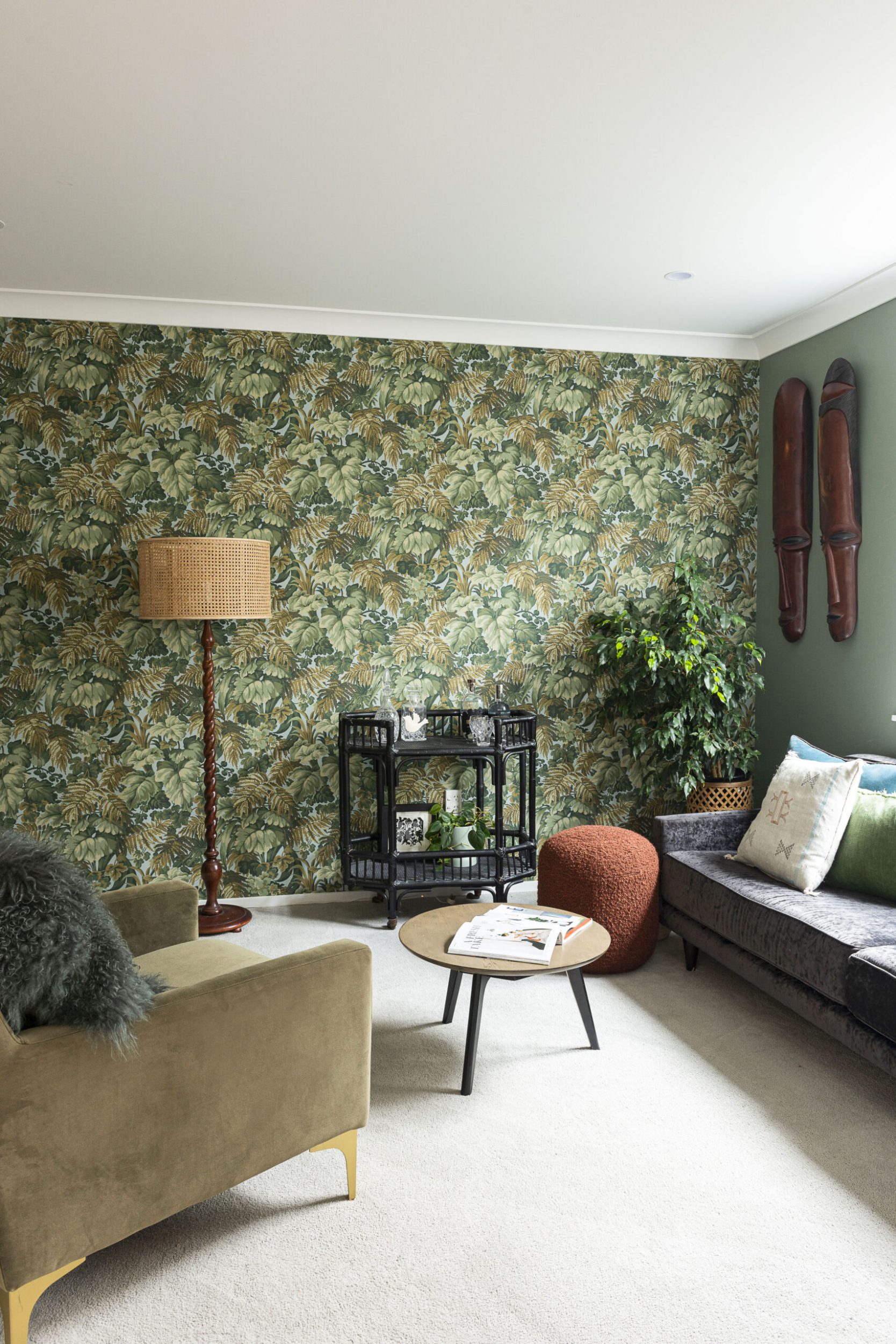 living room with botanical wallpaper