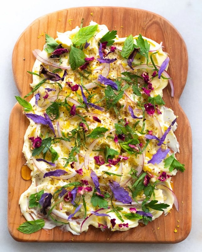 Edible flowers used on butter boards trend.
