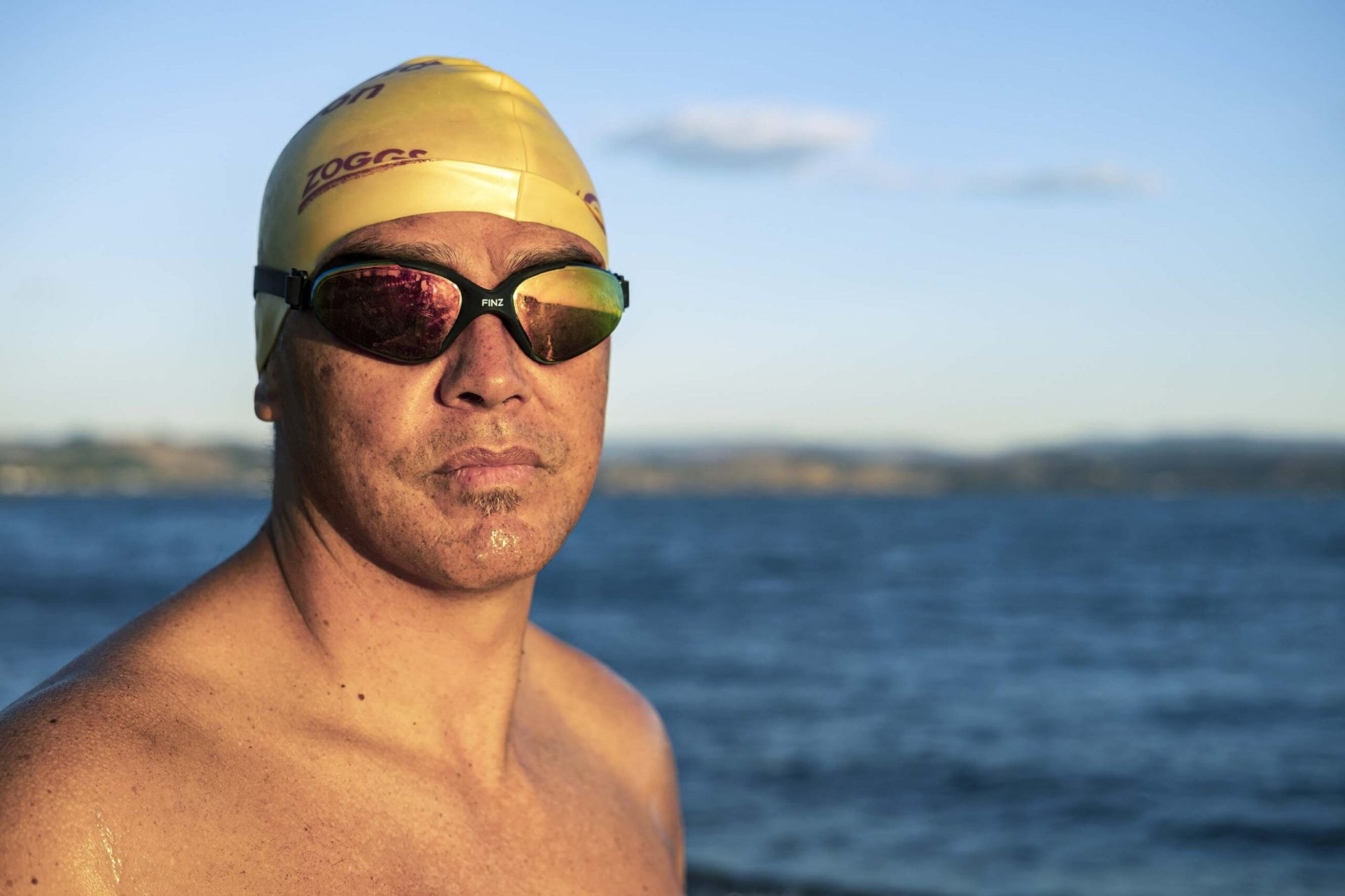 Davey Jones wearing swimming cap and goggles