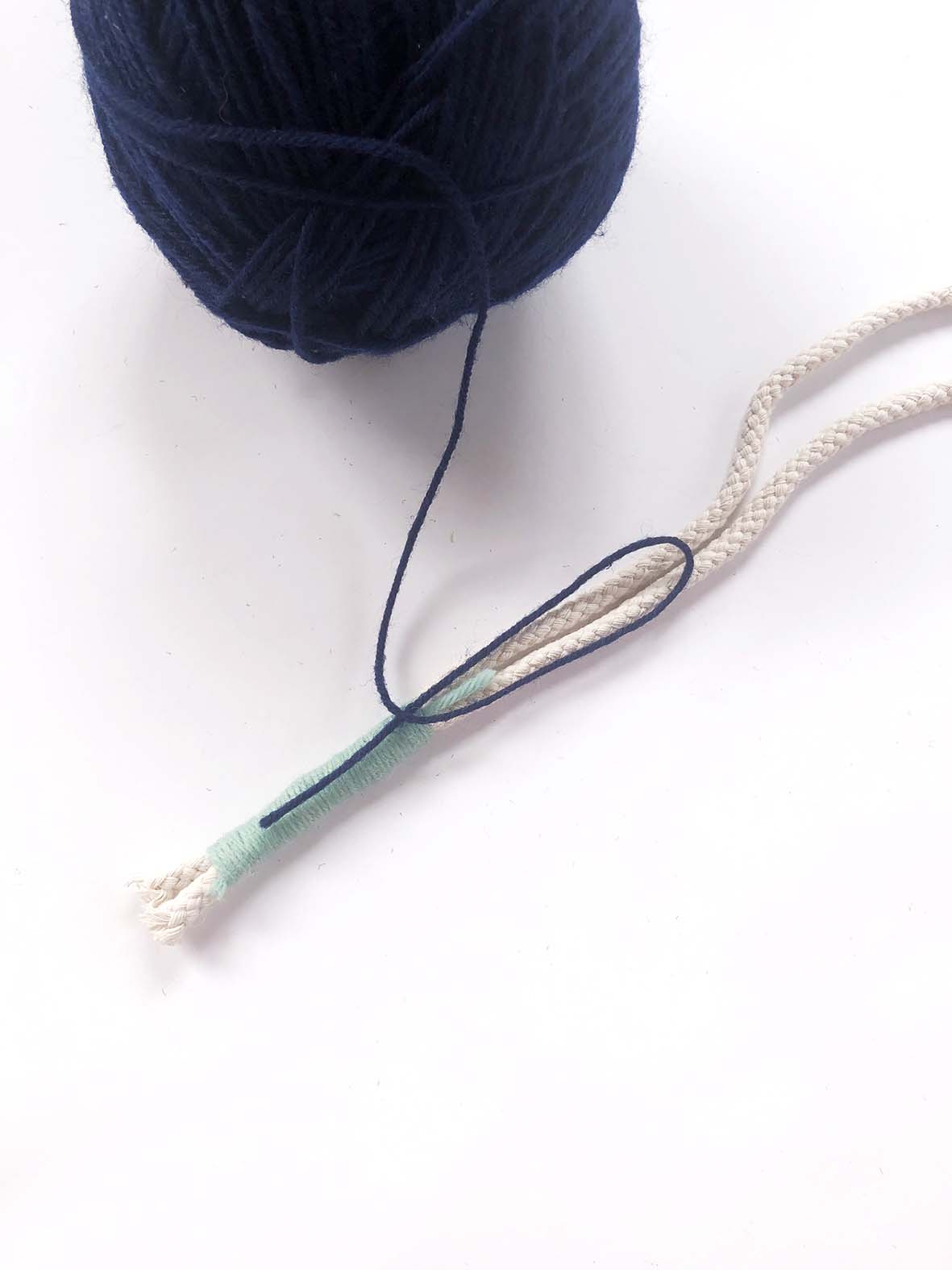 Two cords wrapped together with wool