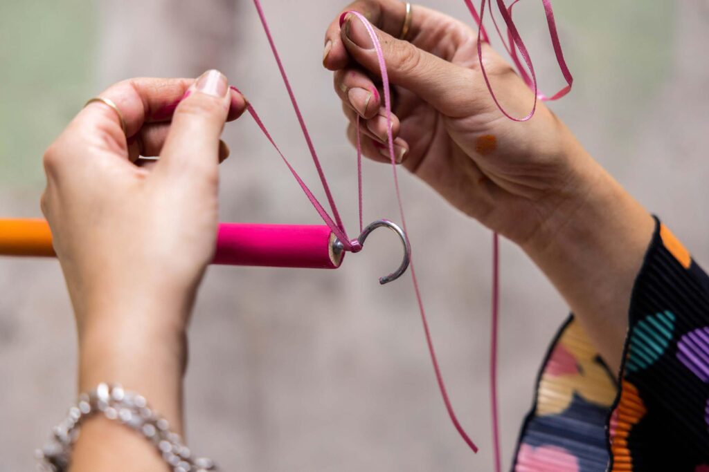 attaching ribbon to the end of the dowel