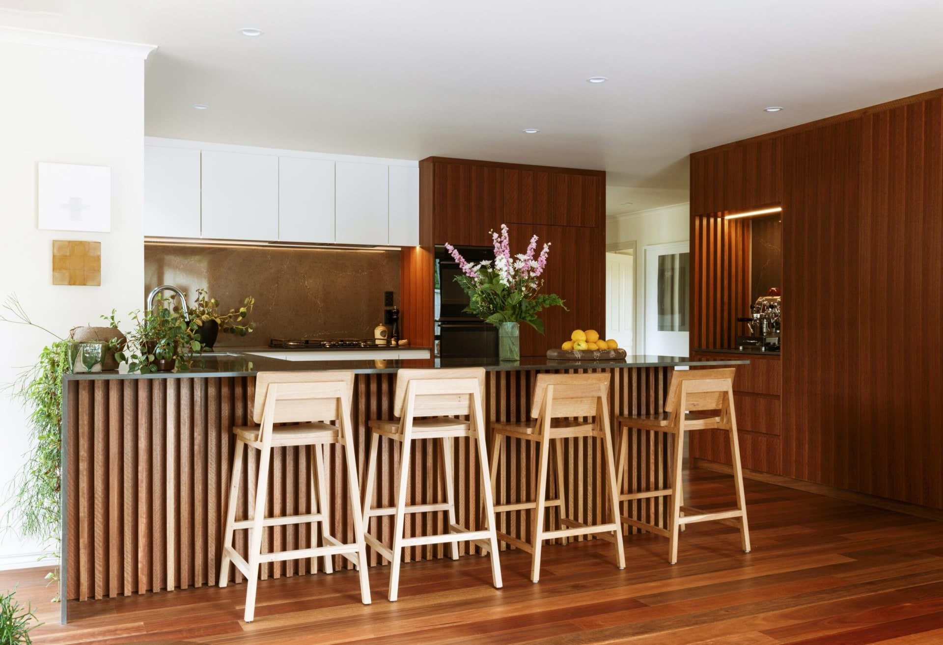 Lynda Wilson's remodelled kitchen made from Australian gum and wooden slats run along the side of the bench