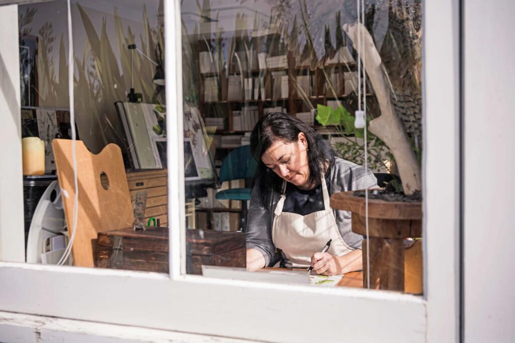 Nikki McIvor working in her studio