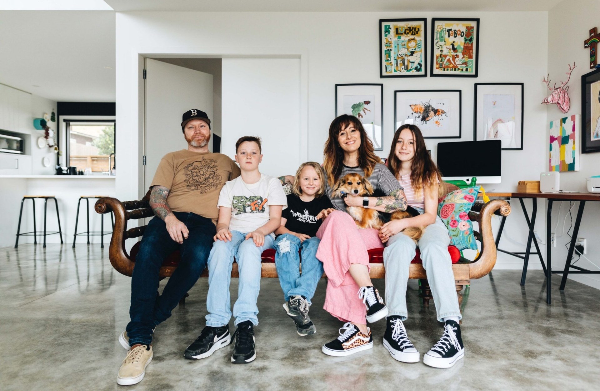 The Street family sitting on the couch in their open plan living room