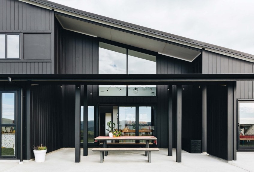 A black weatherboard home