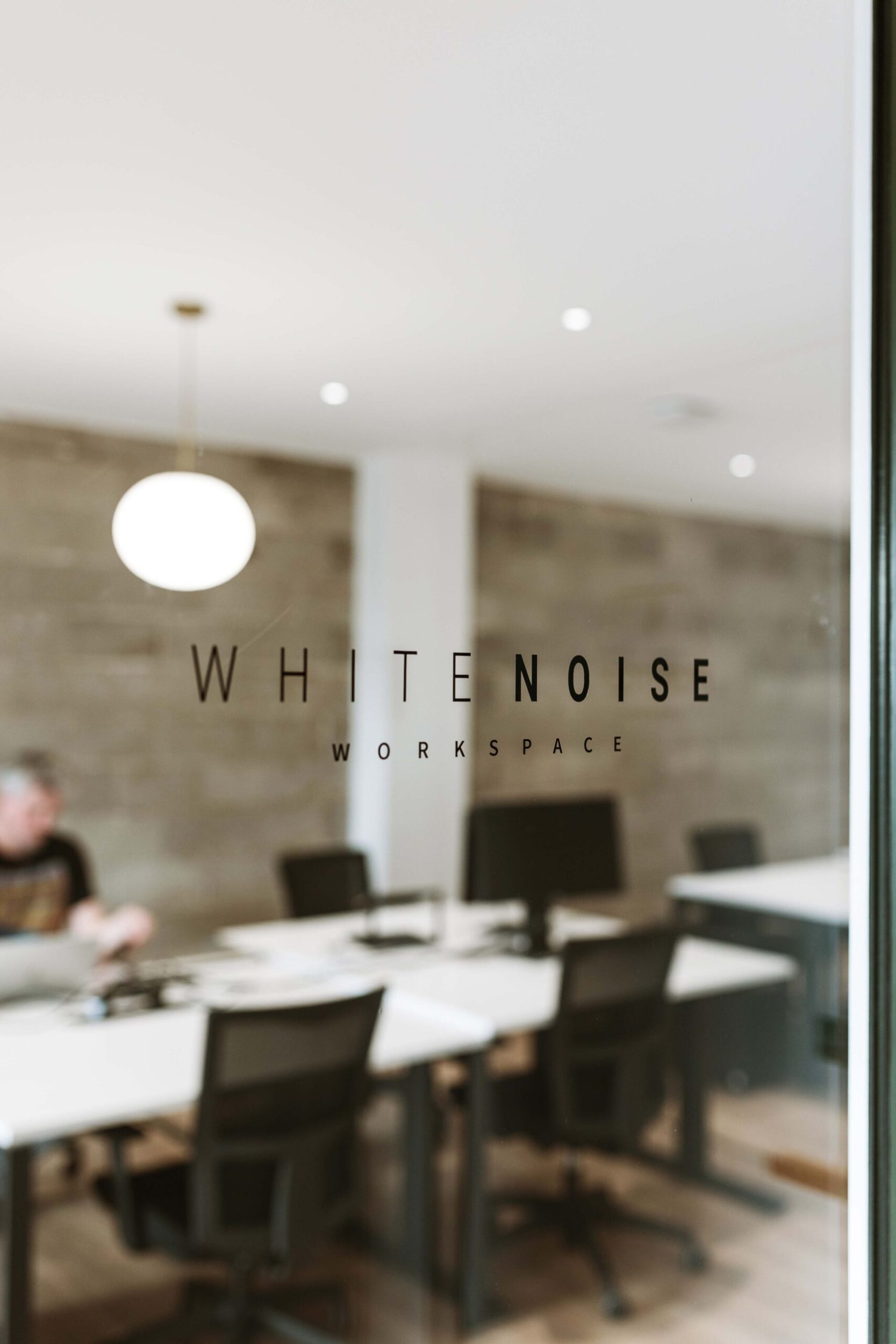 White Noise workspace glass doors to the working space