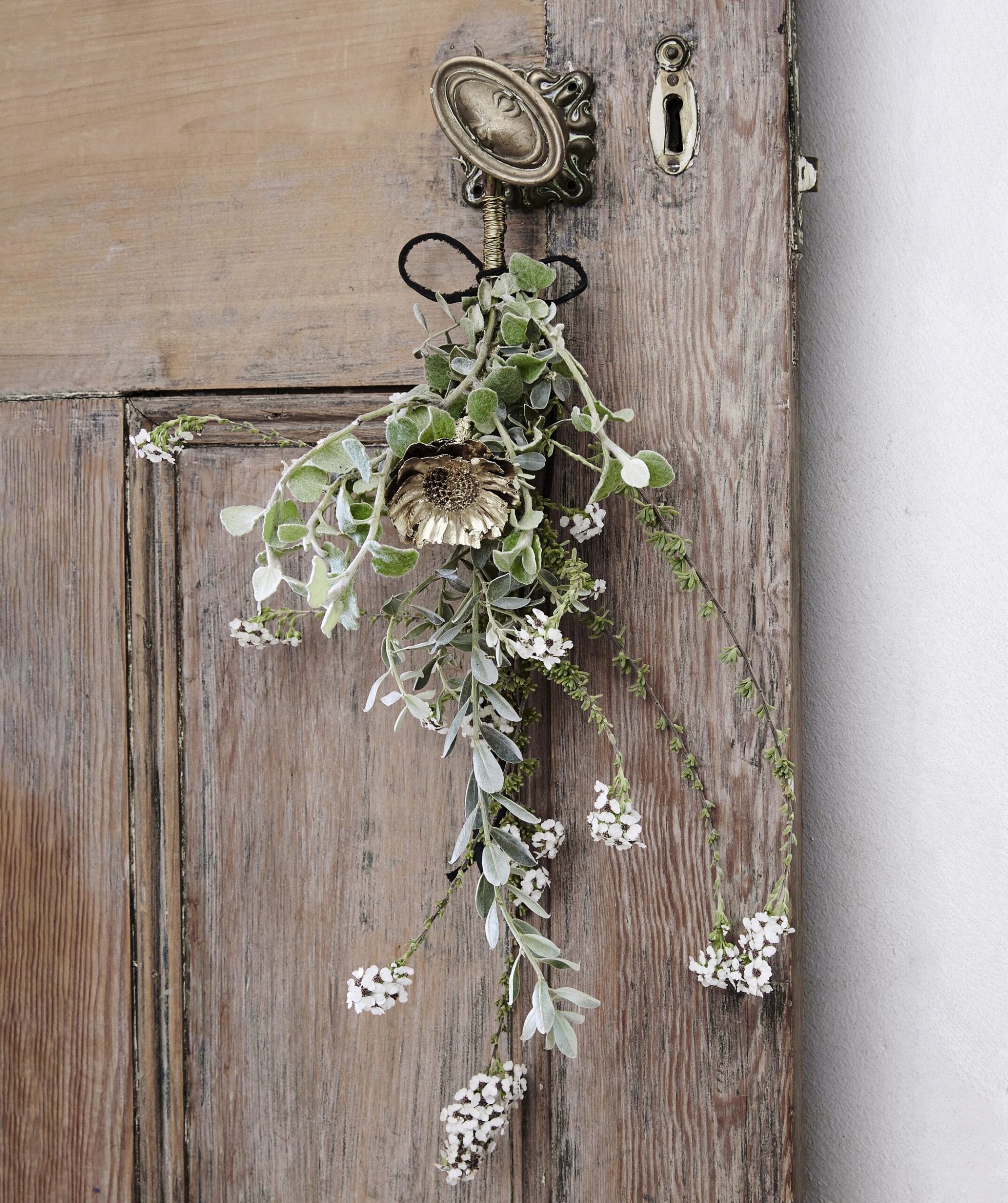 mistletoe hanging from a door handle