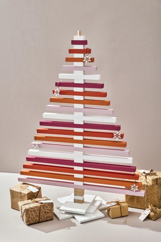 A wooden painted christmas tree