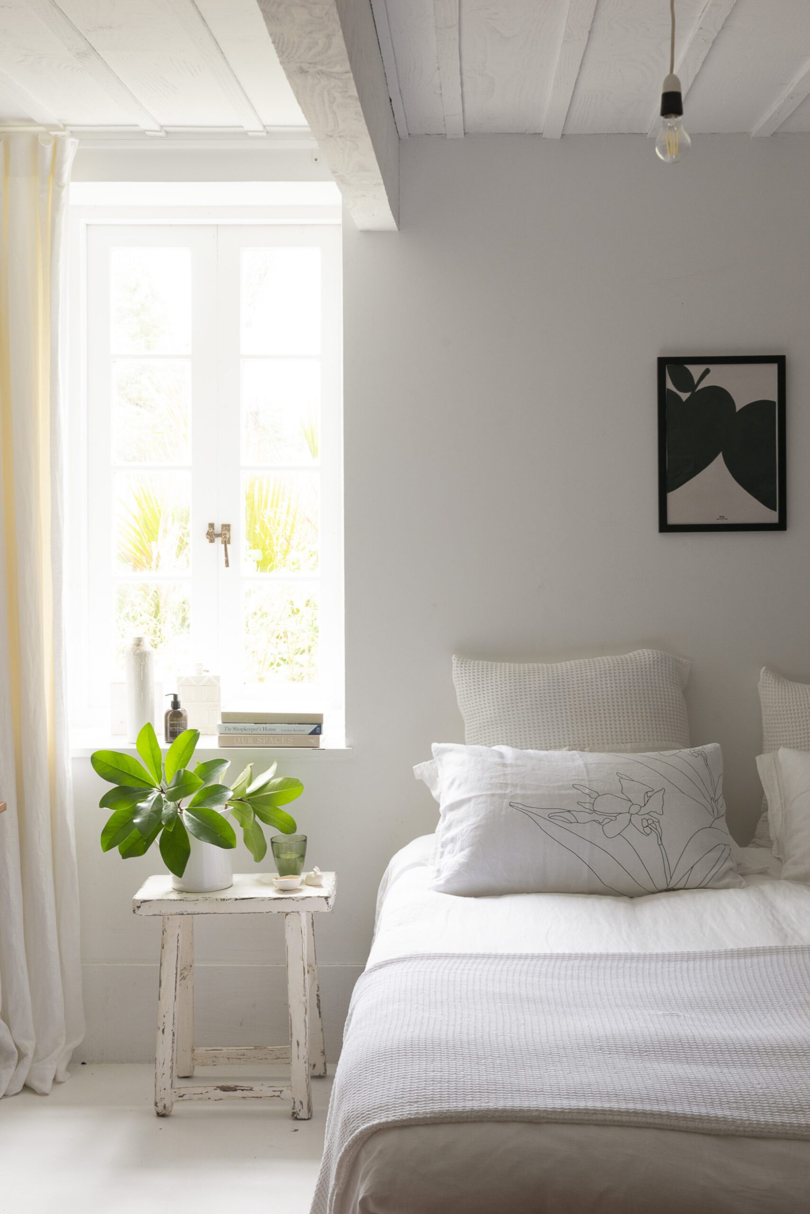 Father Rabbit Claudia Zinzan's bedroom with rustic white stool