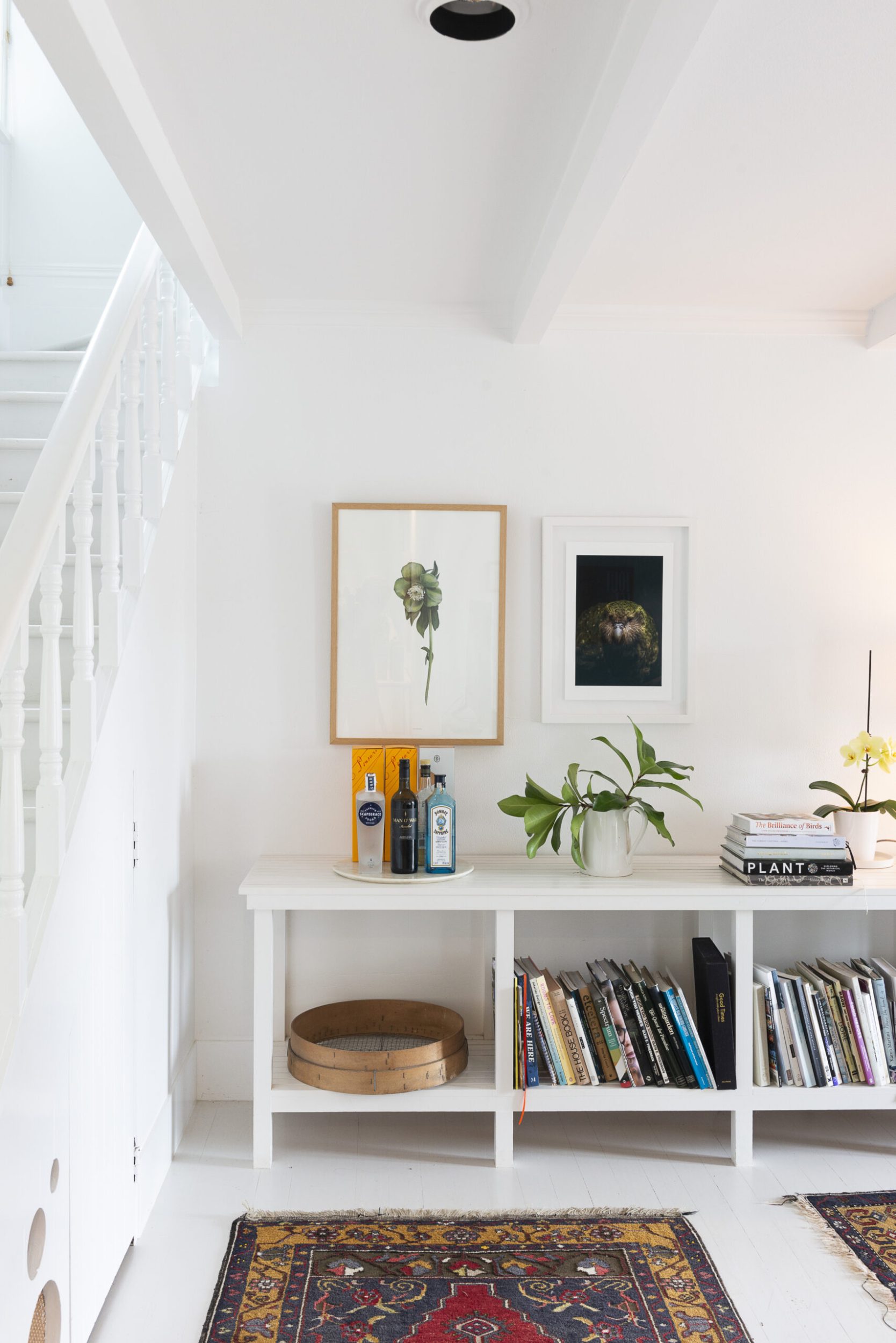Staircase and bookshelf in Claudia Zinzan's home