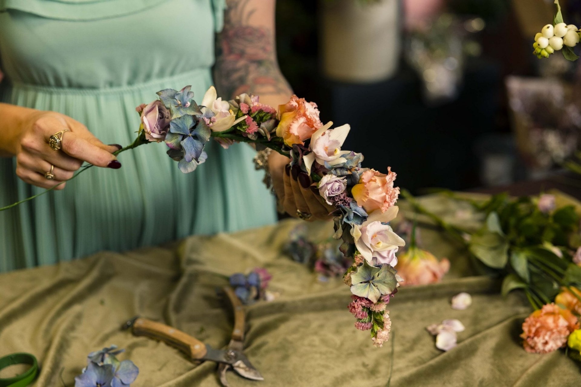 Flowers threaded onto wire flower crown