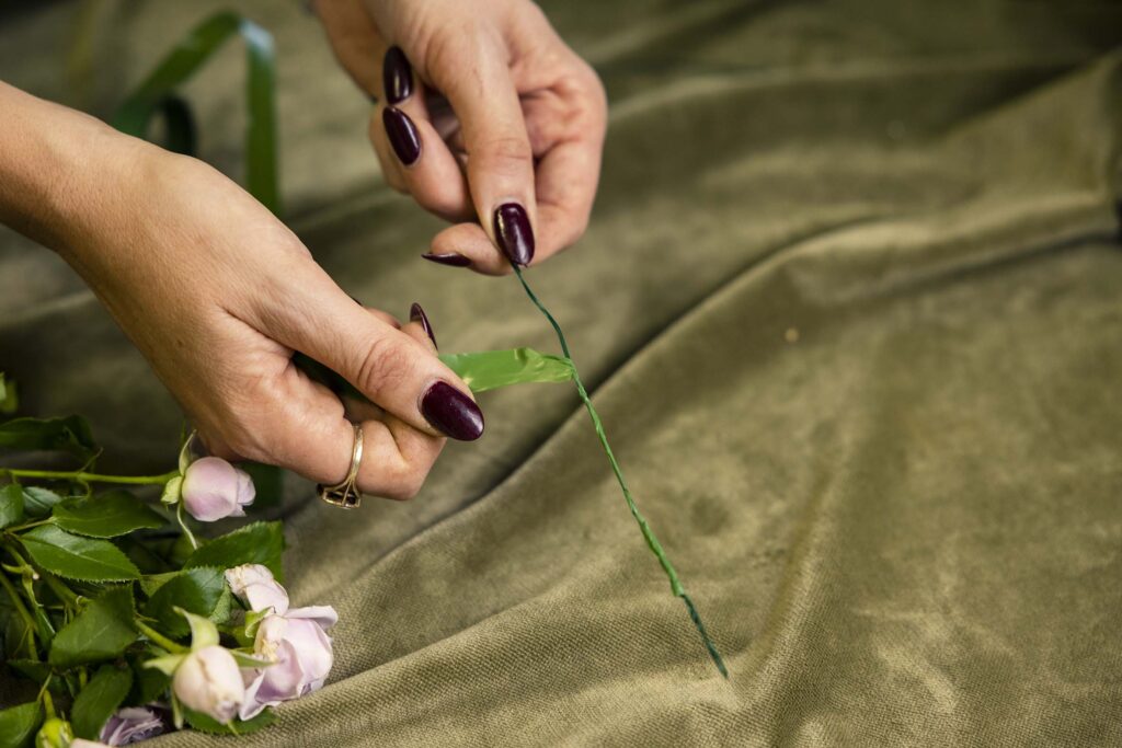 Wrapping tape around wire for a flower crown