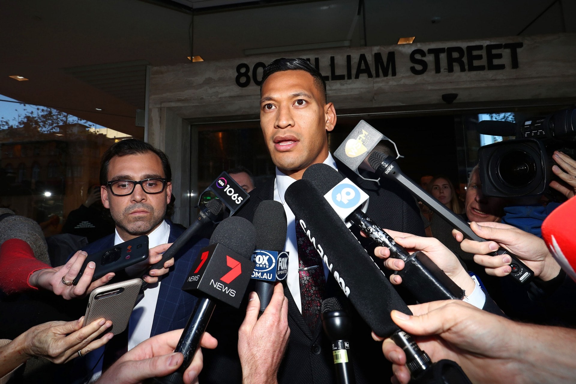 Israel Folau talking to the press