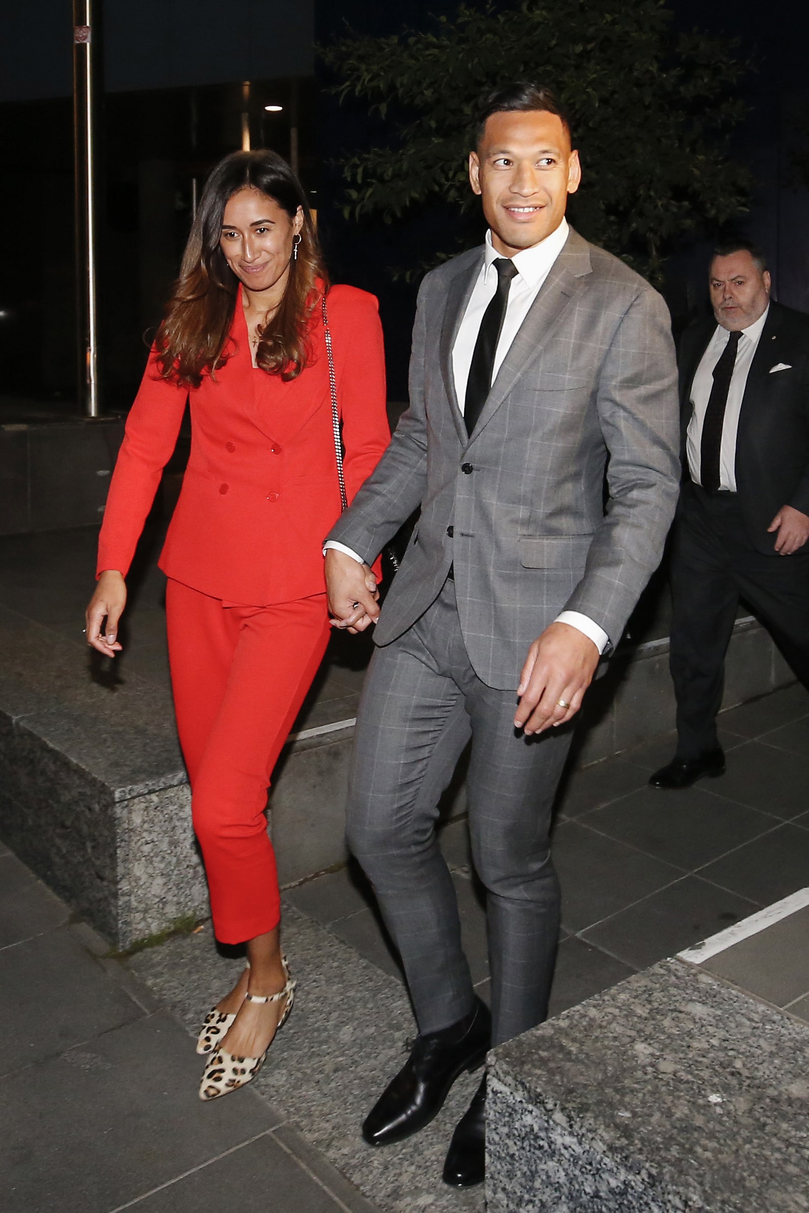 Israel and Maria Folau walking holding hands