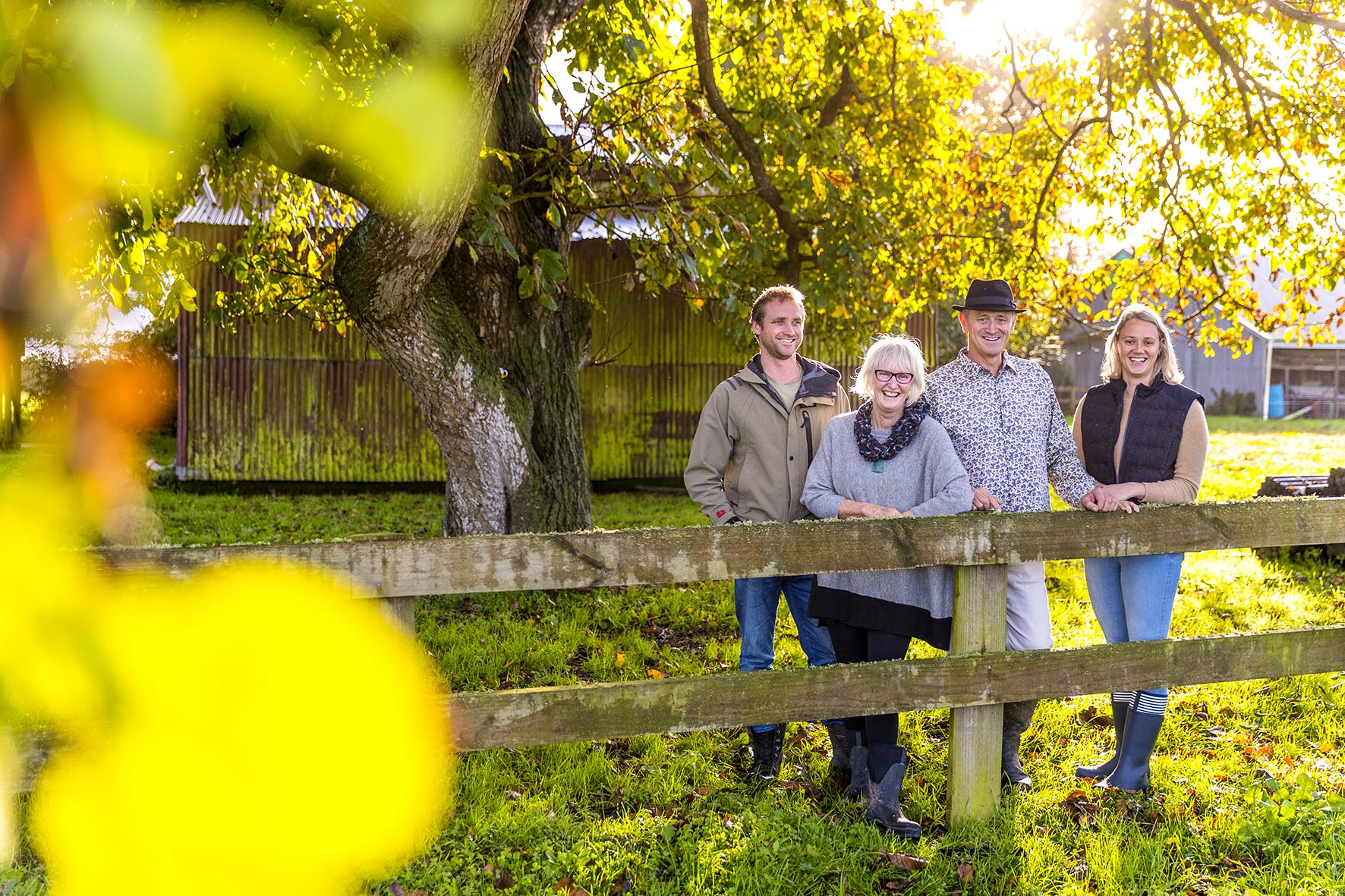 Liz MacKay, John Vosper and Michael and Laura from Jersey Girl Organics standing on a farm 