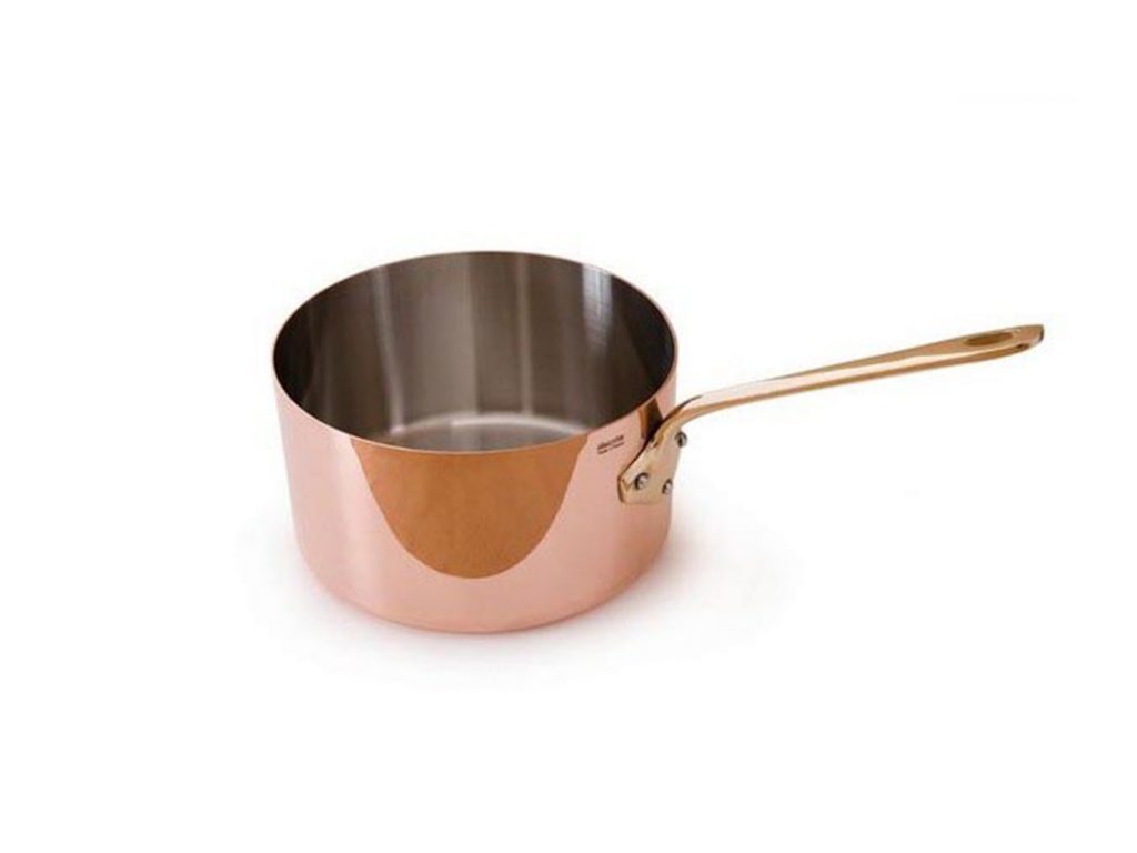 Round copper saucepan with a long handle