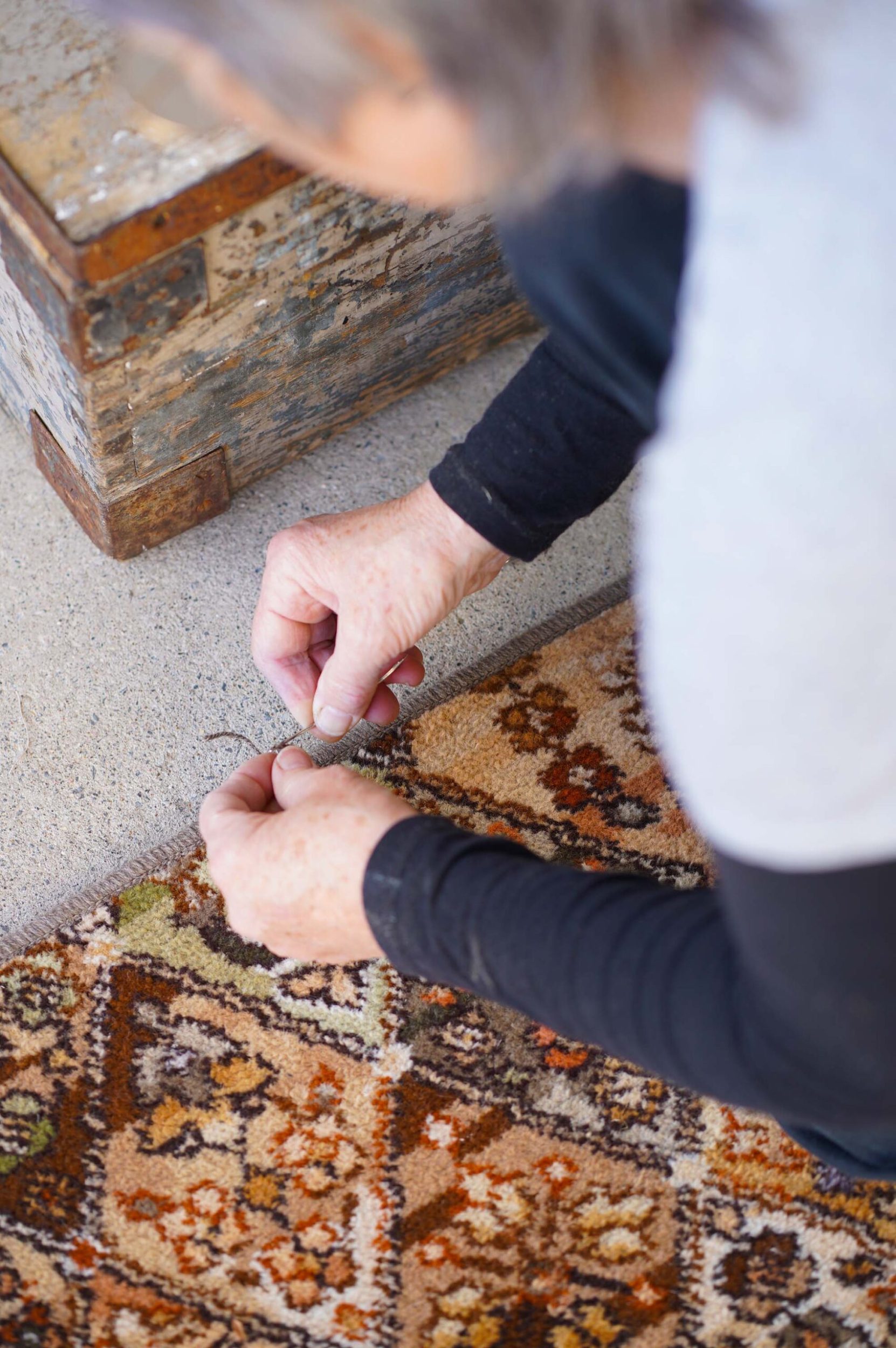 A Mumma Jos rug being sewn