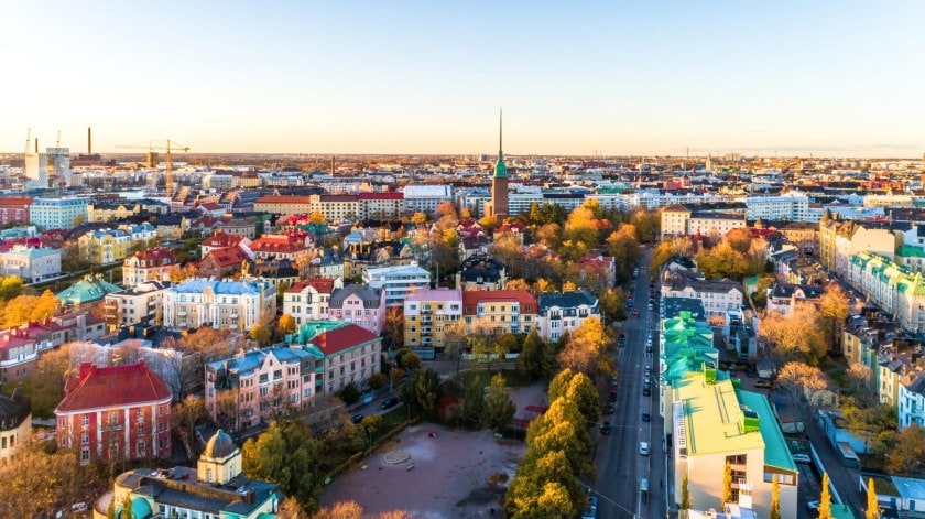 Bird's eye view of a Nordic city with sun shining at night