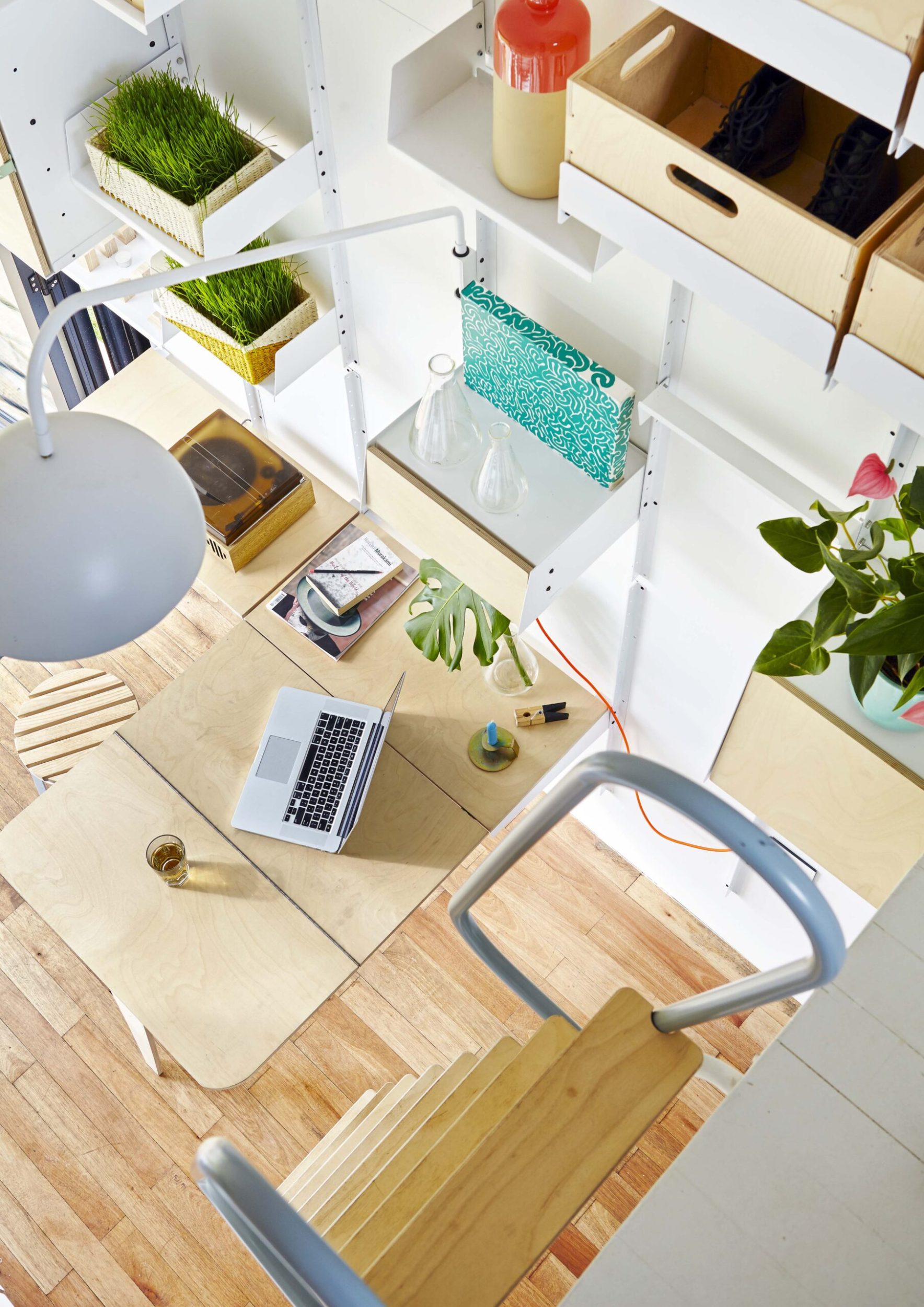 Top view off a small house with a ladder leading to bottom story