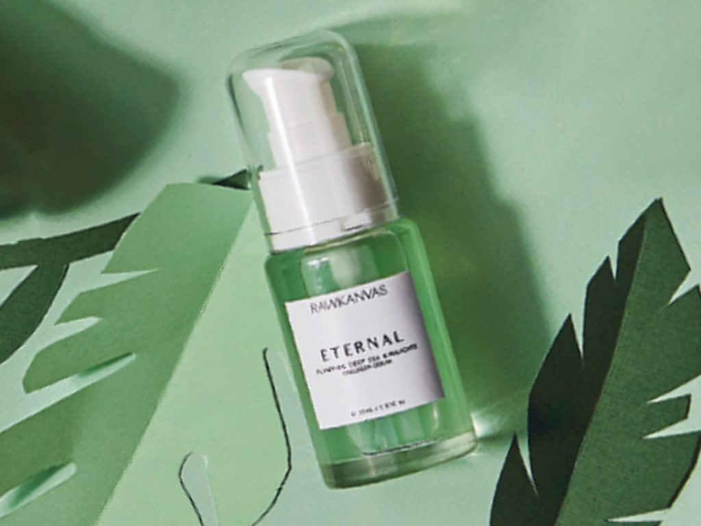 The Edit Midnight Magic Luxury Night Oil on a green background