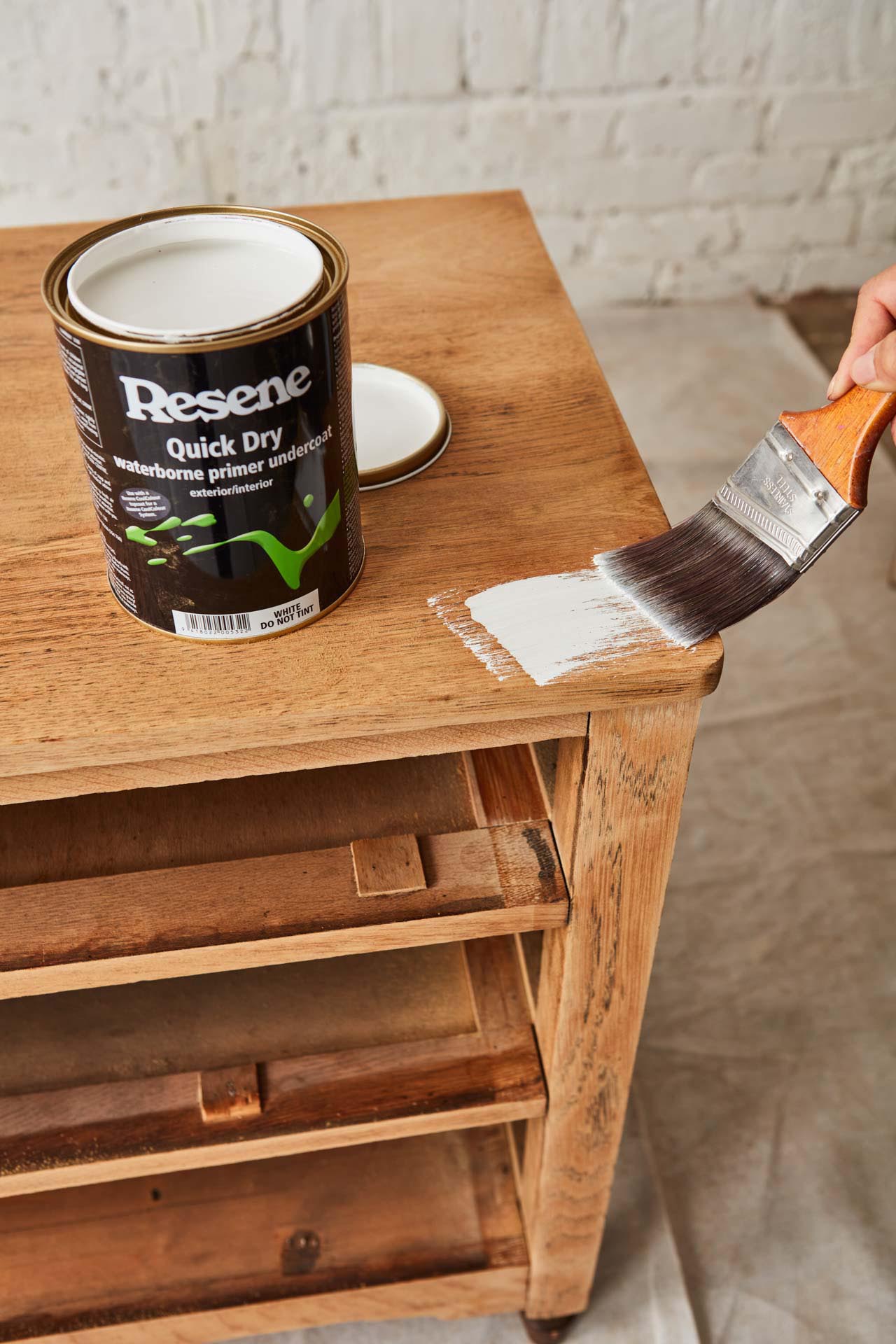 Vintage chest of drawers being painted with Resene Quickdry Primer Undercoat